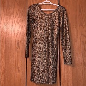 A gold and black dress. Only worn once!!!